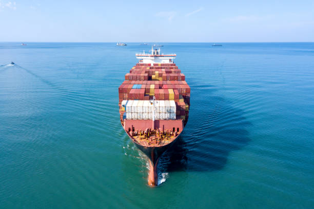 istock Large container ship at sea - Aerial image 1070398190