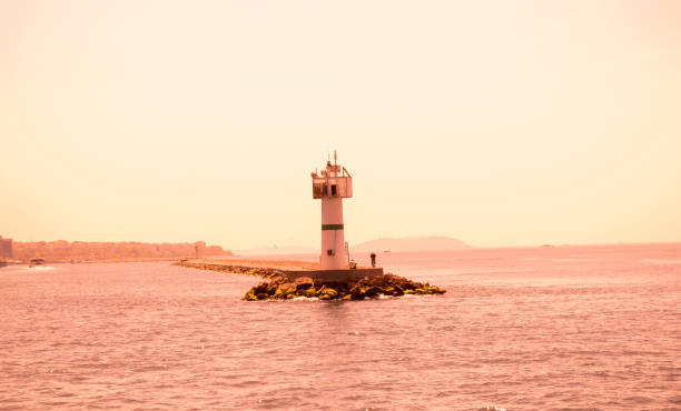 istock A tower at the end of a jetty 1070398226