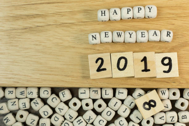 istock Celebration Time new year 2019 on wood plate. 1070398666