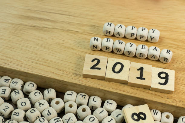 istock Celebration Time new year 2019 on wood plate. 1070398744