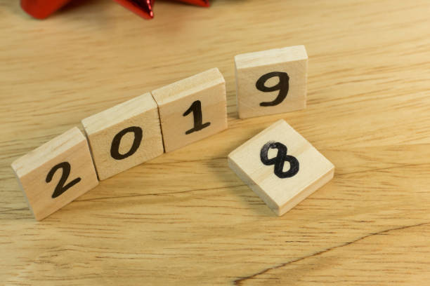 istock Celebration Time new year 2019 on wood plate. 1070399828