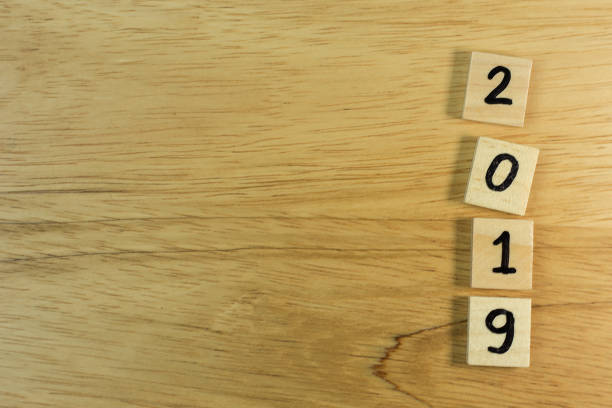 istock Celebration Time new year 2019 on wood plate. 1070399854