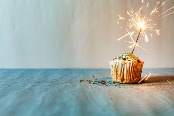 istock Cupcake, burning sparkler, congratulations, homemade, copy space 1070410574