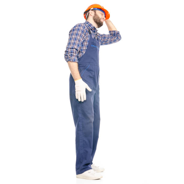 istock Young man builder industry worker hardhat pain head headache 1070410876