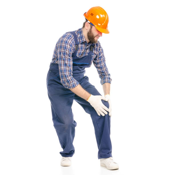 istock Young man builder industry worker hardhat pain leg knee 1070410932