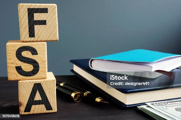 Flexible Spending Account Fsa Written On A Wooden Cubes Stock Photo - Download Image Now