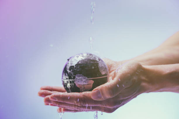 istock Water pouring on planet earth 1070420066