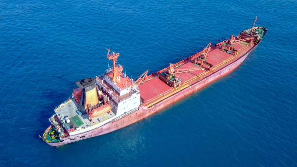 istock General cargo ship at sea - Aerial image 1070433610
