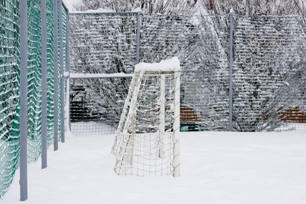 istock Public playground in winter covered by snow 1070437154