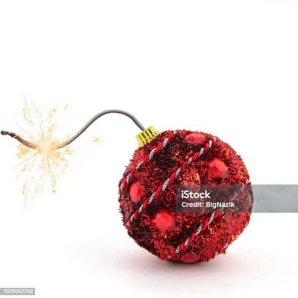 Christmas Tree Decoration Red Bomb Ready To Go Off With Golden Sparkles On White Background New Year Concept Stock Photo - Download Image Now
