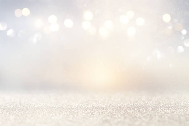 istock glitter vintage lights background. silver and light gold de-focused. 1070462706