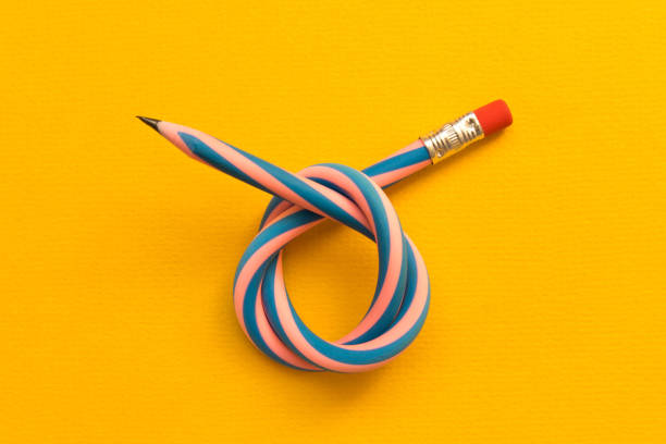 istock Flexible pencil . Isolated on yellow background 1070474326