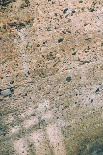 古い石造りの壁のテクスチャと背景 - patched brick pattern textured ストックフォトと画像