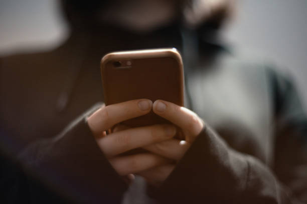 istock Teenager Using Smartphone And Writing Text Messages To Her Friends 1070485044