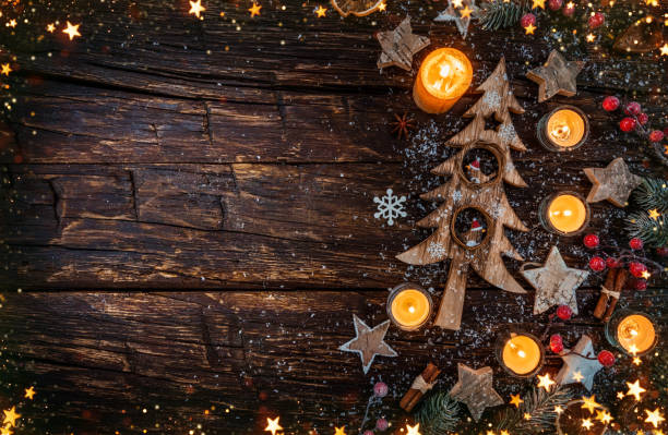 istock Christmas background with wooden decorations and candles. 1070495506