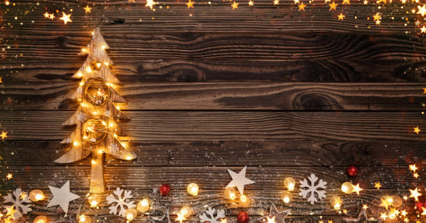 istock Christmas background with wooden decorations and candles. 1070495724