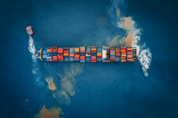 istock Aerial view of cargo ship, cargo container in warehouse harbor. 1070496110