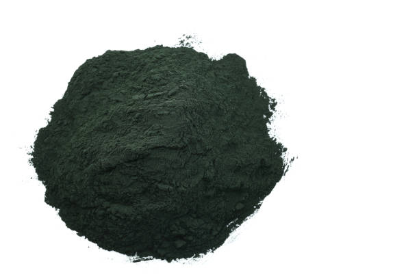 istock Spirulina powder isolated on white background 1070496528