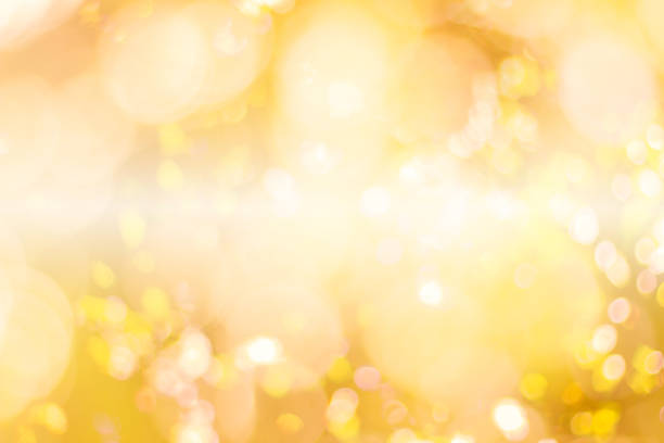 istock Abstract glamorous white silver and gold bokeh lights glitter sparkle. Defocused background have luxury golden color party invite for birthday, anniversary, holliday, new yearâs eve or Christmas. 1070497106