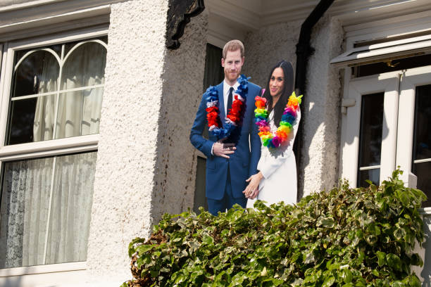 Cardboard cut outs of Meghan Markl and Prince Harry on a house front in Windsor celebrating the marriage of Meghan Markle and Prince Harry at St George's Chapel at Windsor Castle 19th May, 2018, Windsor, England - Cardboard cut outs of Meghan Markl and Prince Harry on a house front in Windsor celebrating the marriage of Meghan Markle and Prince Harry at St George's Chapel at Windsor Castle duchess photos stock pictures, royalty-free photos & images