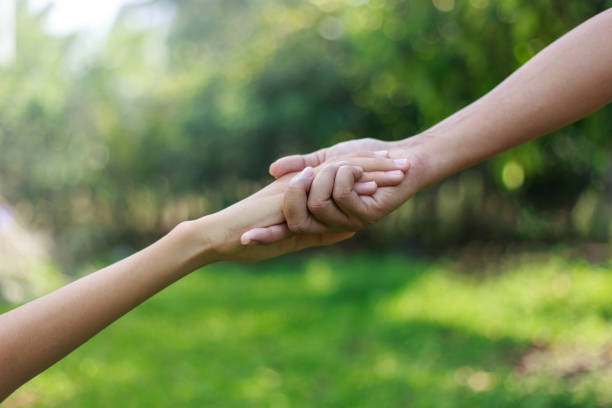 istock Family support - father and son hands 1070507488