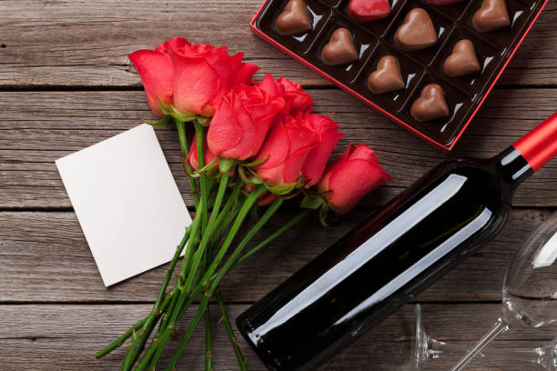 istock Red roses, wine bottle and chocolate box 1070507784