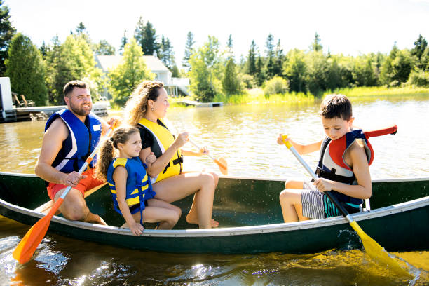 istock Family in a Canoe on a Lake having fun 1070509556