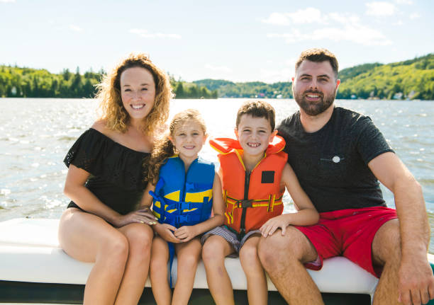 istock Family out boating together having fun on vacancy 1070509688