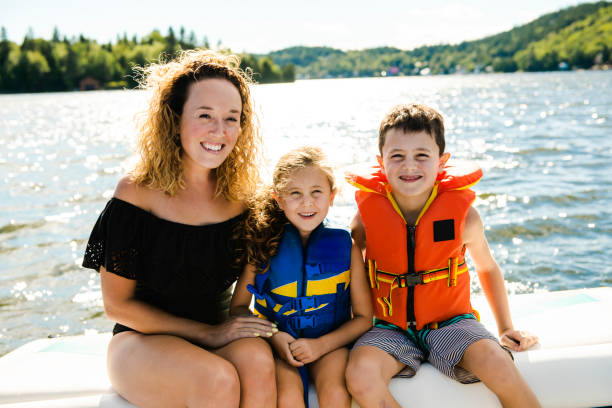 istock Family out boating together having fun on vacancy 1070509698