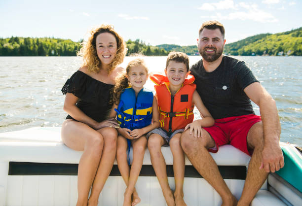 istock Family out boating together having fun on vacancy 1070509718
