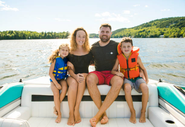 istock Family out boating together having fun on vacancy 1070509724