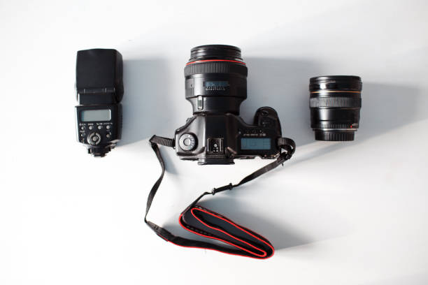 istock Photographer set. Camera, lense, and flash. White background. 1070511222