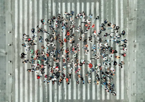 Photo of High Angle View Of People forming a speech bubble
