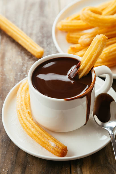 istock Delicious hot chocolate with churros breakfast 1070515586