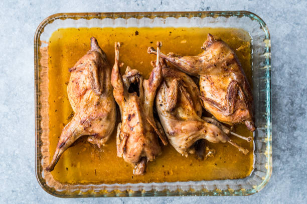 istock Roasted Crispy Quail Meat in Glass Bowl / Fried Small Chickens. 1070516006