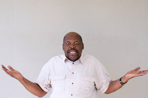 istock Senior African male expression portrait decisions confused 1070517788