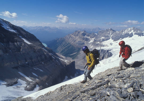 istock Mountain climbers explore the Canadian Rockies 1070523676