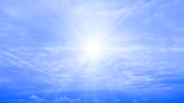 istock sun ray and blue sky with clouds isolated nature background 1070527324