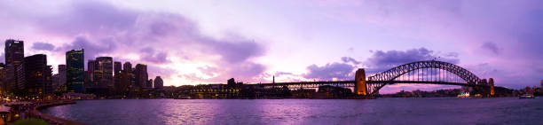 sydney harbour bridge - sydney harbor panoramic sydney australia skyline - fotografias e filmes do acervo