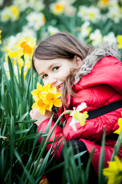 istock Spring girl in flowers 1070547984