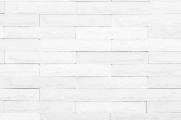 istock Seamless Grey pattern of decorative brick sandstone wall surface with concrete of modern style design decorative uneven have cracked realmasonry wall of multicolored stones or blocks with cement. 1070558568