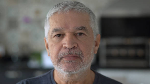 istock Senior Man Portrait at Home 1070562276