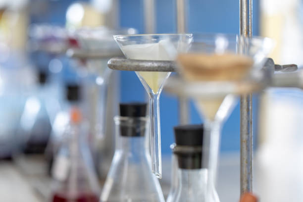 istock The study Separating by filtration and evaporation condensation the component substances from liquid mixture in Lab. 1070574830