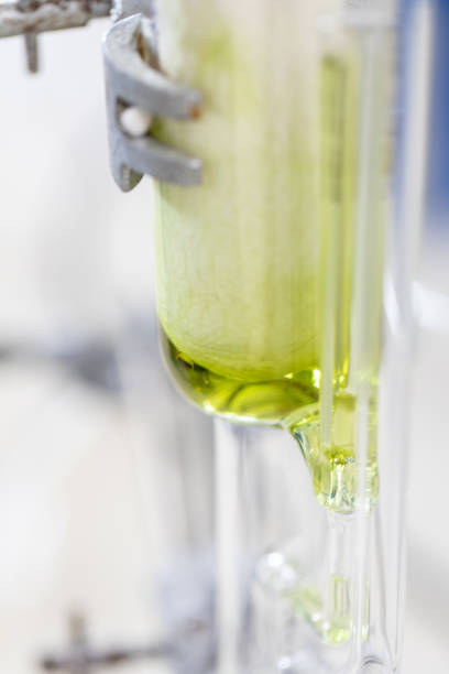 istock The study Separating by filtration and evaporation condensation the component substances from liquid mixture in Lab. 1070575176