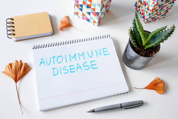 autoimmune disease written in a notebook stock photo
