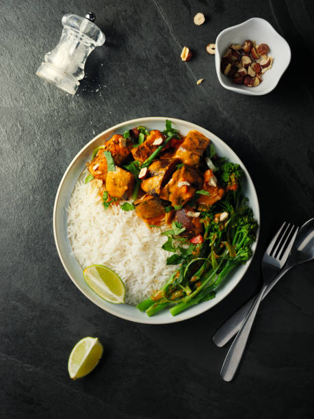 Healthy vegetarian Thai red curry with rice stock photo