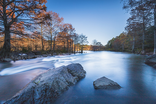 A late afternoon long exposure of the lower Mountain Fork River near Broken Bow Oklahoma