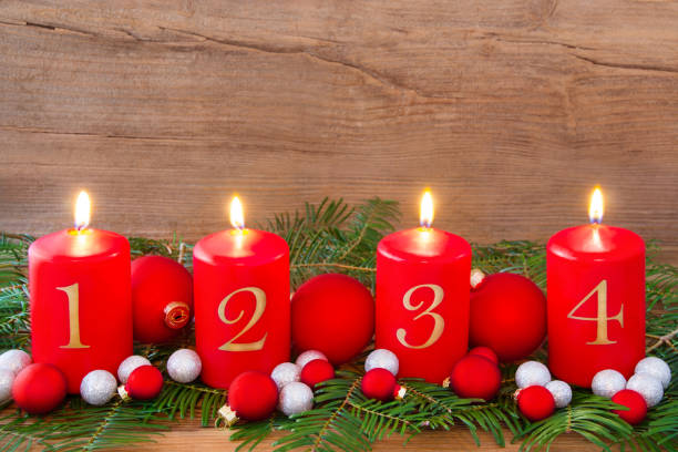 istock Advent decorations and four red candles 1070585660