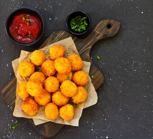 istock cheese balls with tomato sauce. 1070593904