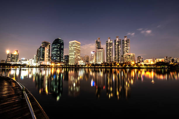 istock Modern night city skyline with lights reflection 1070594226